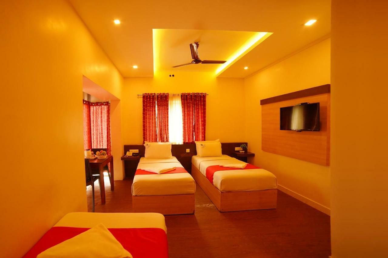 Hotel Lumino Dwellings à Munnar Extérieur photo
